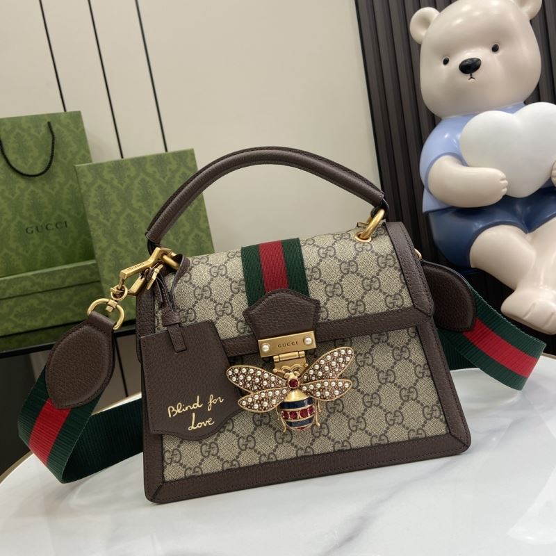 G*u*i top handle bags